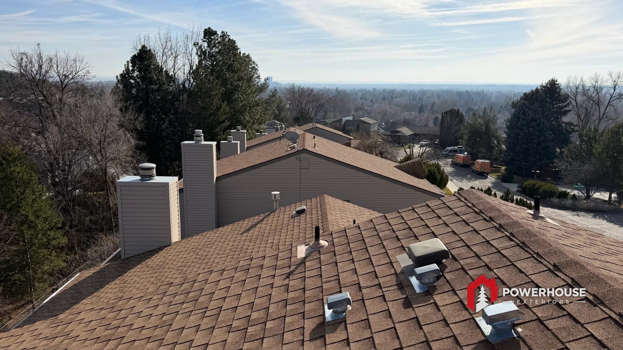 Asphalt shingle roofs overlooking Boise and the Treasure Valley.